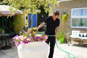 Watering the plants at Sherwood House care home
